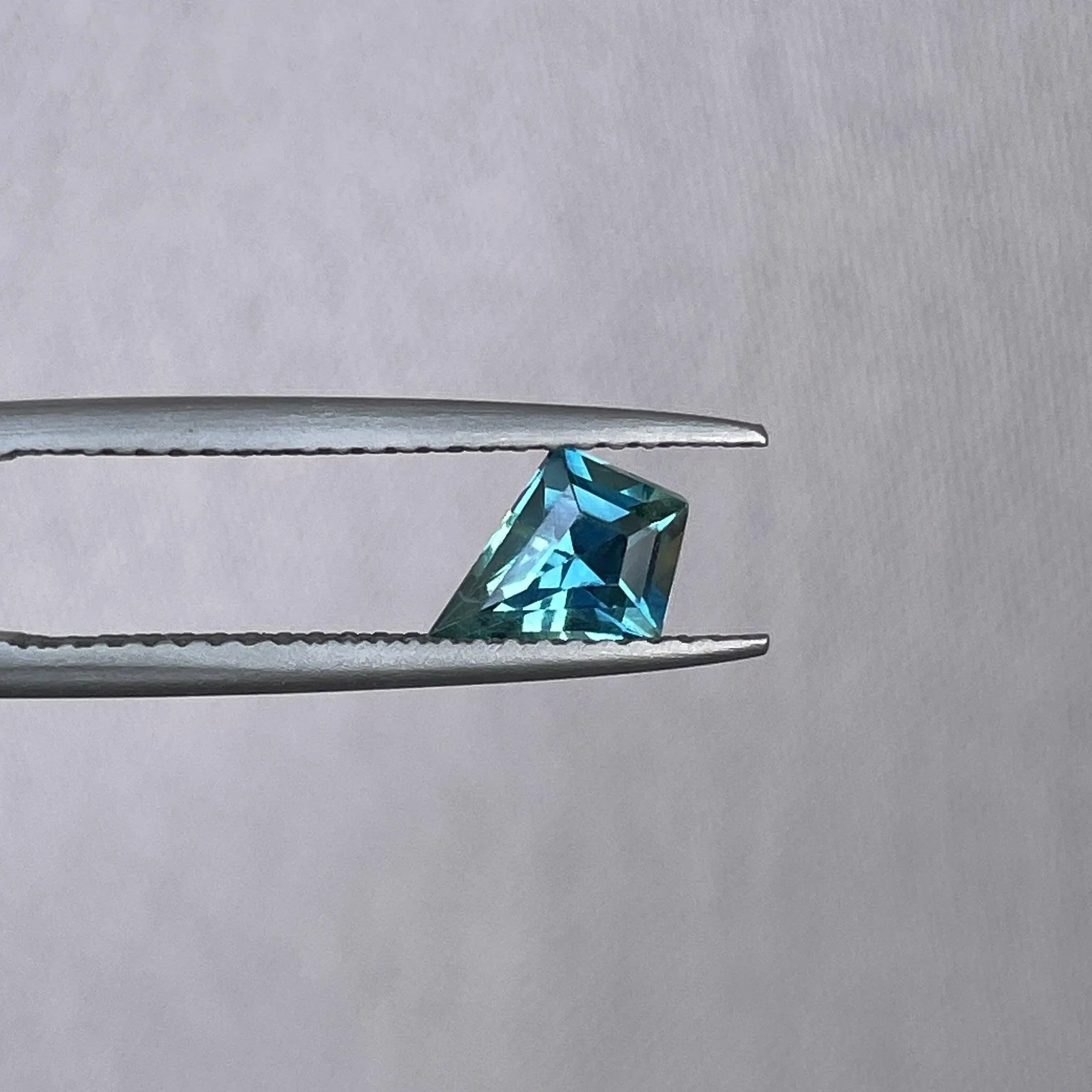 0.92 ct kite teal sapphire