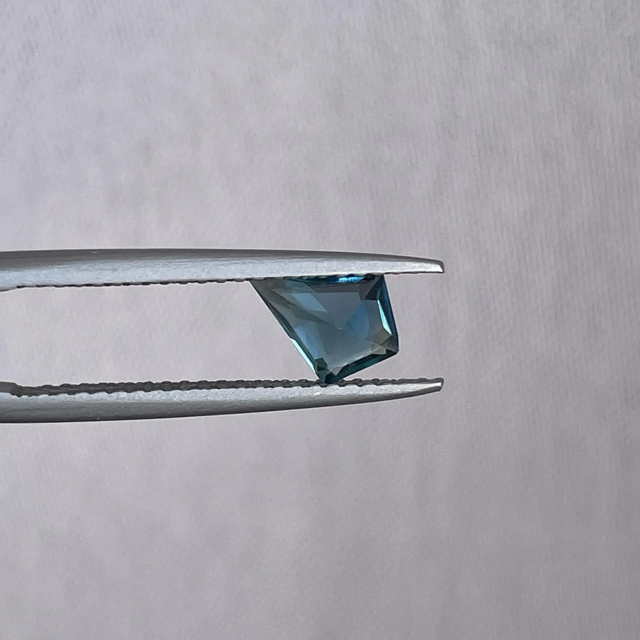 0.92 ct kite teal sapphire