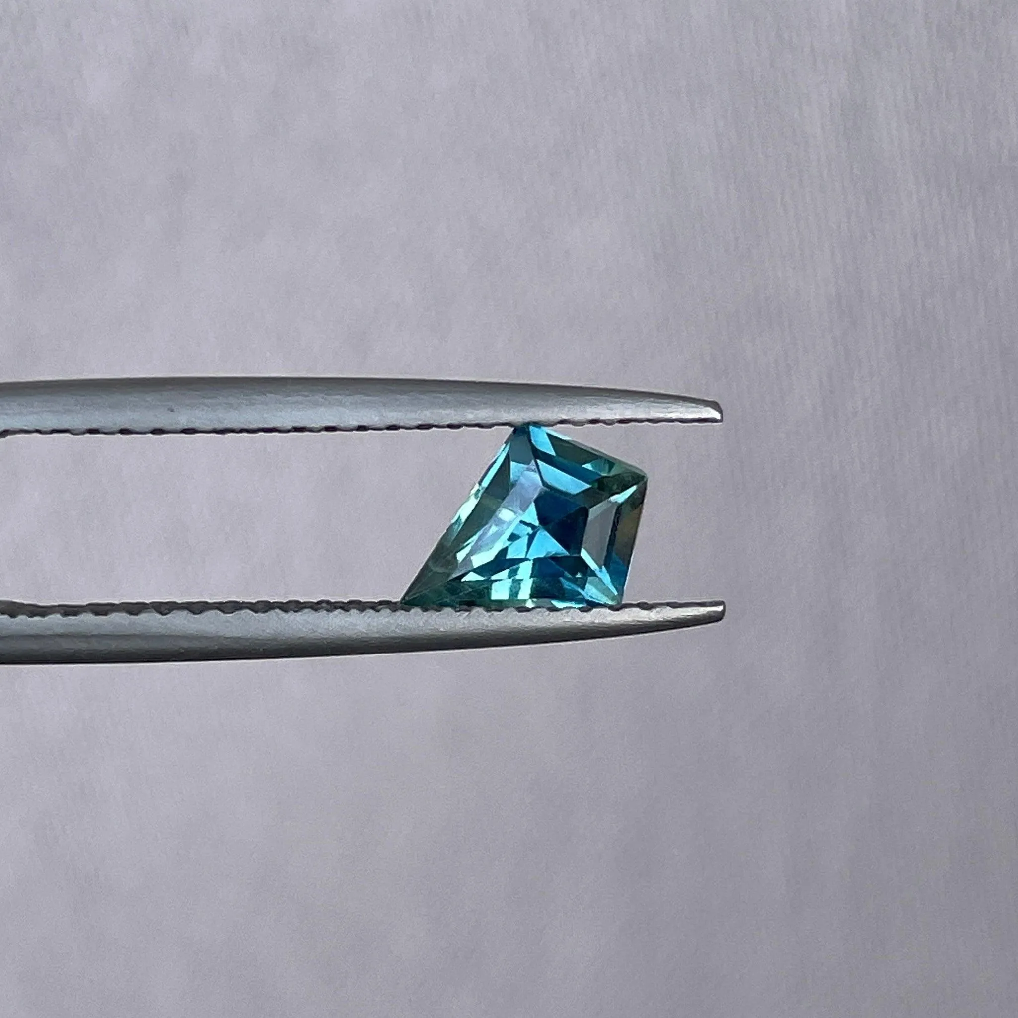 0.92 ct kite teal sapphire